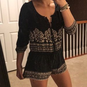 Beautiful Ripcurl romper black and tan